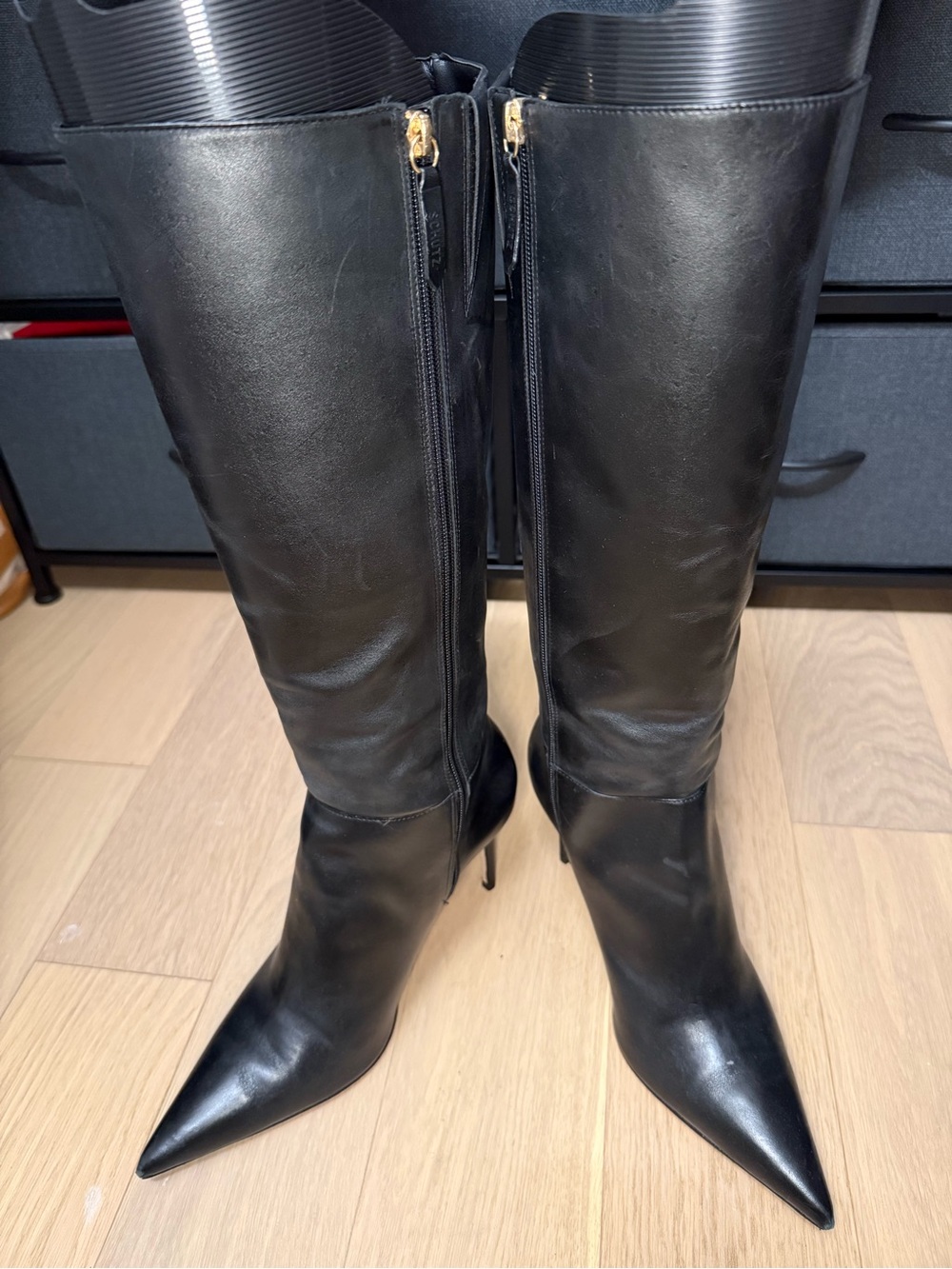 SCHUTZ Black Pointed-Toe Knee-High Leather Boots with Gold Zippers